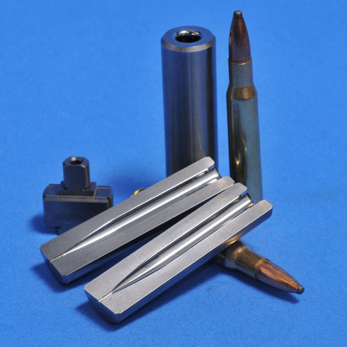 Metal and carbide bullet and casing pieces